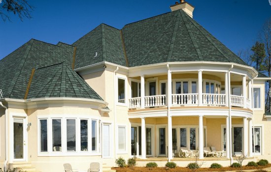 Beautiful home roof with difficult pitch